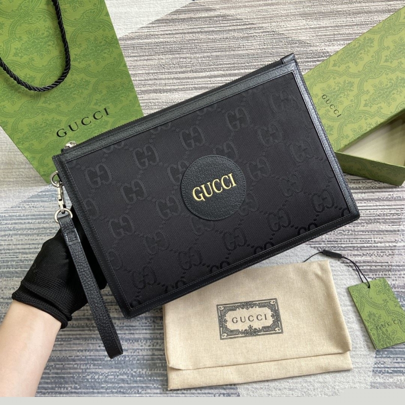 G*u*i clutch bags